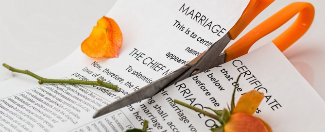 marriage certificate being torn